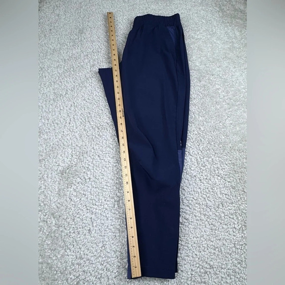 Under Armour Squad 2.0 Womens Tapered
Training Warm-Up Pant. Navy Blue. Large - Picture 11 of 12